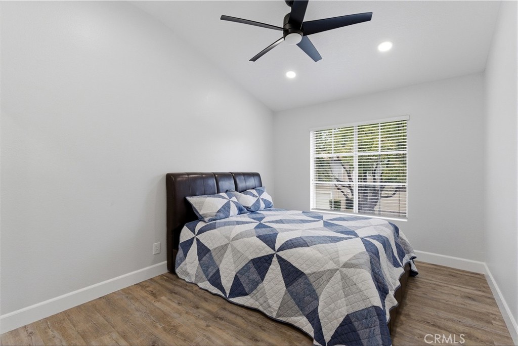 8070 East Oak Ridge Circle Anaheim Hills, CA 92808 - Photo 17 of 22 a bedroom with a bed and a window