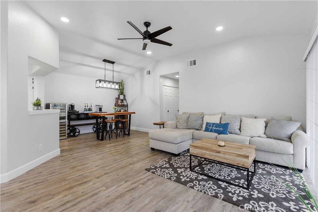 8070 East Oak Ridge Circle Anaheim Hills, CA 92808 - Photo 4 of 22 a living room with furniture and a wooden floor