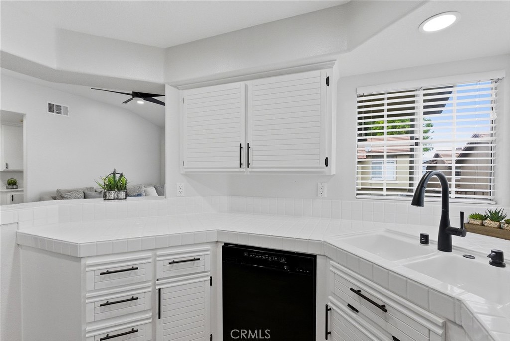 8070 East Oak Ridge Circle Anaheim Hills, CA 92808 - Photo 10 of 22 a kitchen with a sink and cabinets
