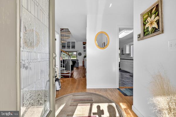 419 Williamsville Road Houston, DE 19954 - Photo 19 of 65 a view of a hallway to a livingroom with furniture