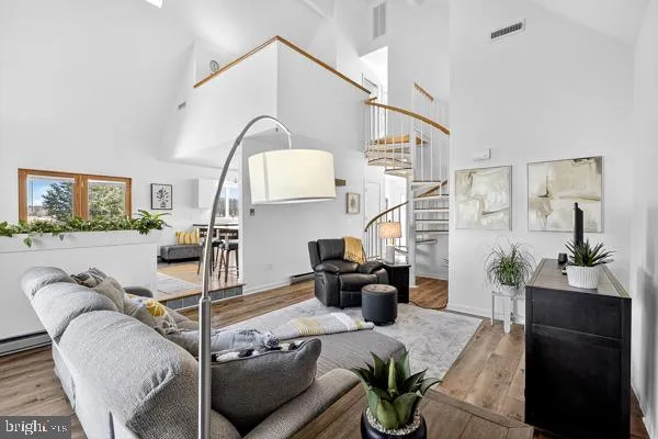 a bathroom with a granite countertop toilet sink and a shower