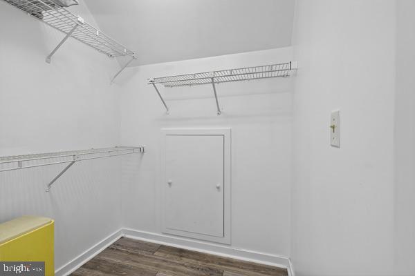 419 Williamsville Road Houston, DE 19954 - Photo 46 of 65 a view of storage and utility room with racks on the wall