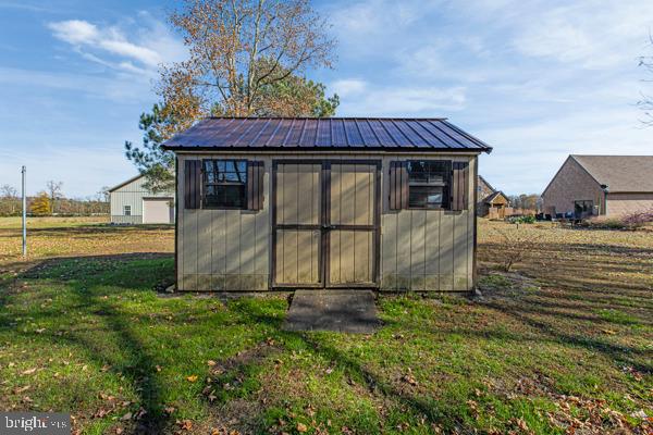 419 Williamsville Road Houston, DE 19954 - Photo 55 of 65 a view of a back yard of the house