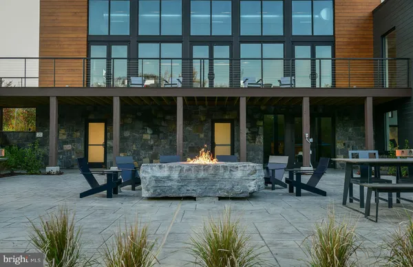a view of a building with sitting area