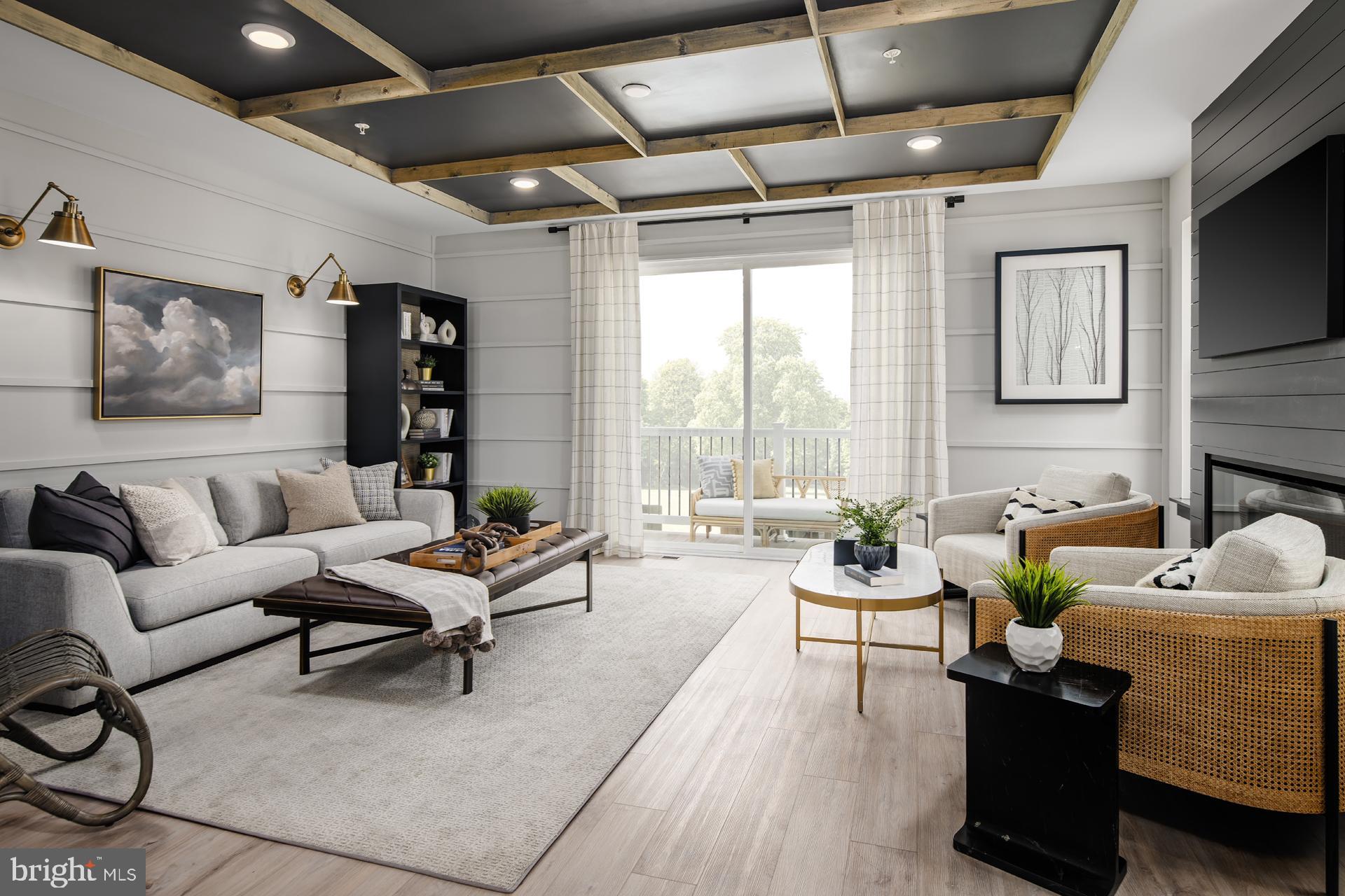 227 Light Street Baltimore, MD 21230 - Photo 7 of 29 a living room with furniture and a large window