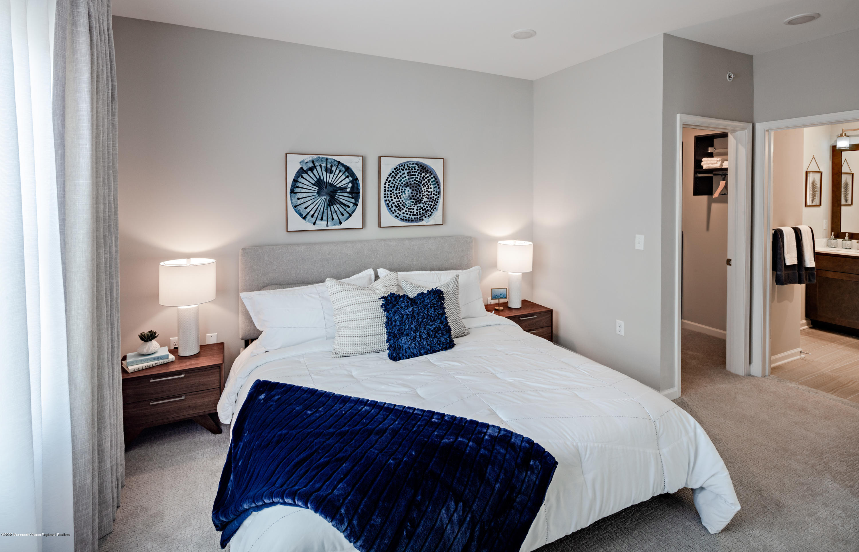 3404 Jessica Circle Freehold, NJ 07728 - Photo 12 of 15 a bedroom with a bed and a lamp on dresser