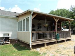 6771 Lovel Cook Road Springfield, TN 37172 - Photo 15 of 18 a view of a house with backyard and porch