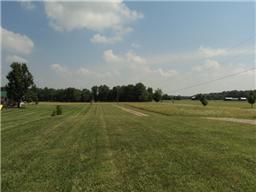 6771 Lovel Cook Road Springfield, TN 37172 - Photo 17 of 18 a view of a lake with houses in the back