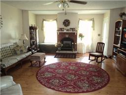6771 Lovel Cook Road Springfield, TN 37172 - Photo 2 of 18 a living room with furniture and a fireplace