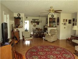 6771 Lovel Cook Road Springfield, TN 37172 - Photo 8 of 18 a living room with furniture and a flat screen tv