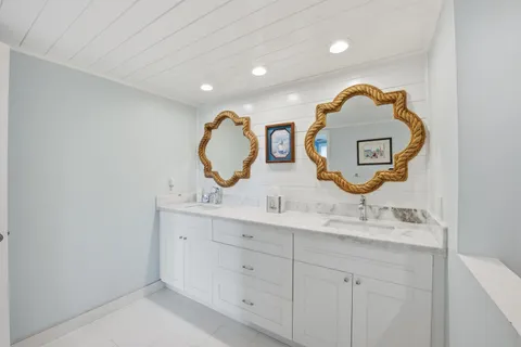 a view of a chair and tables on the terrace