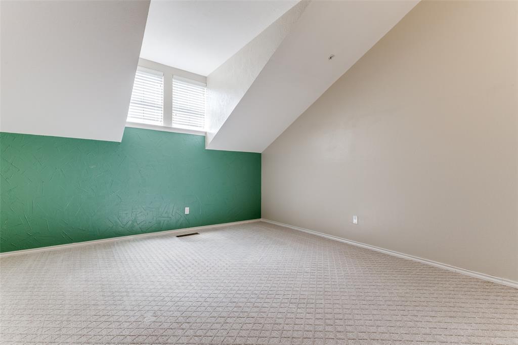 5565 Preston Oaks Road, Unit 237 Dallas, TX 75254 - Photo 11 of 14 a view of an empty room with a window