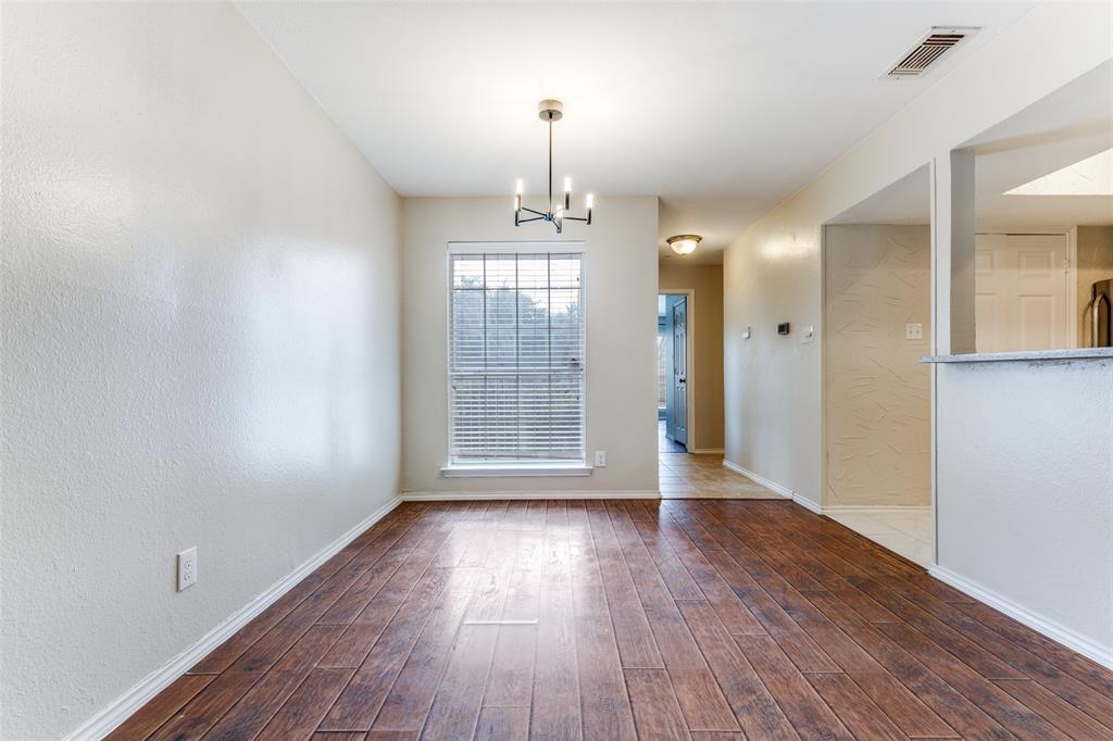 5565 Preston Oaks Road, Unit 237 Dallas, TX 75254 - Photo 12 of 14 a view of livingroom with hardwood floor and window