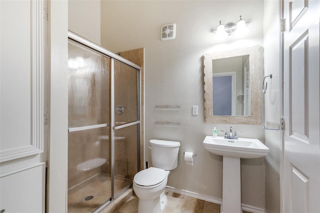 5565 Preston Oaks Road, Unit 237 Dallas, TX 75254 - Photo 10 of 14 a bathroom with a sink toilet and shower