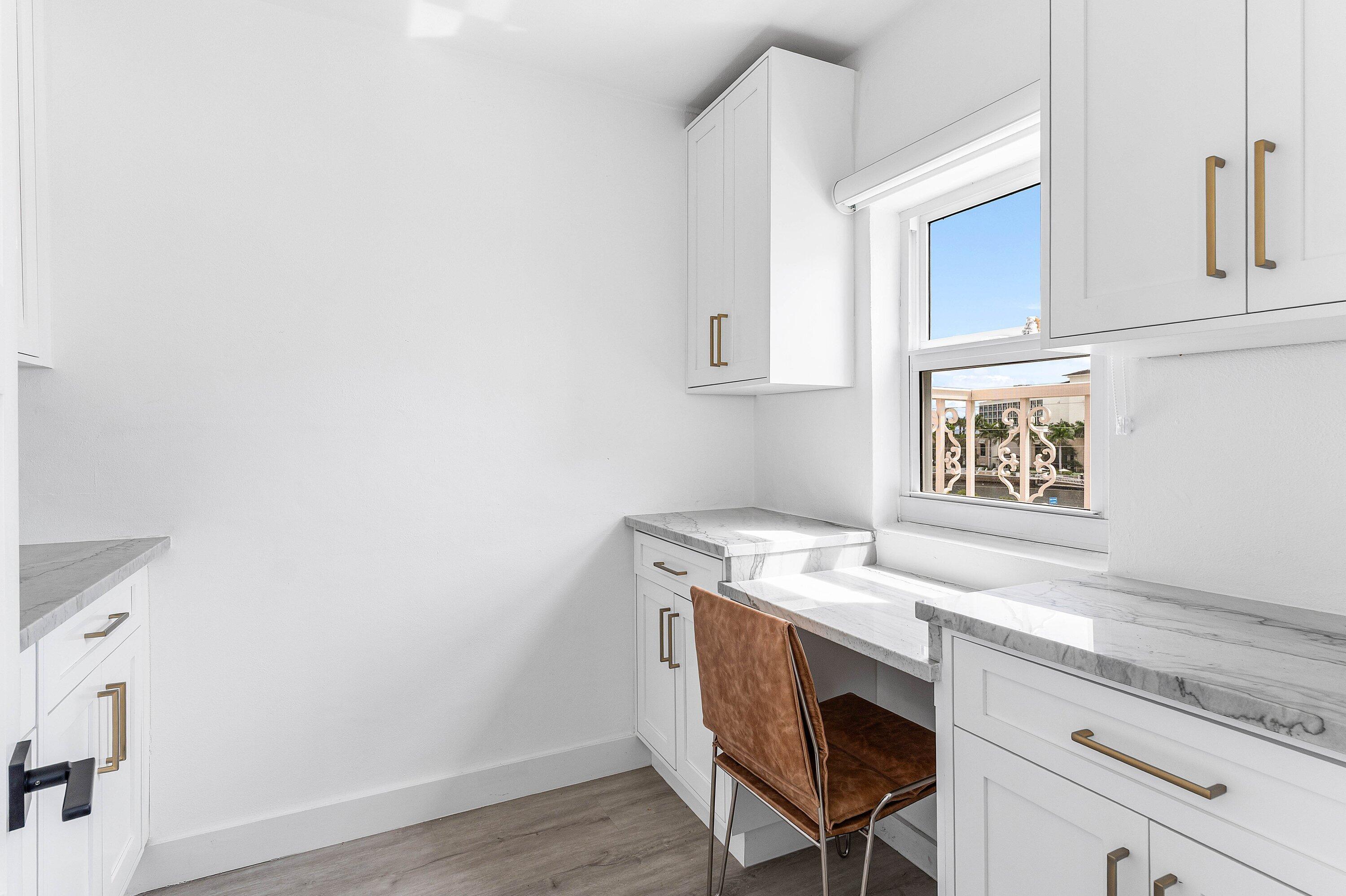 1001 East Camino Real, Unit 4040 Boca Raton, FL 33432 - Photo 23 of 44 a workspace with furniture and window