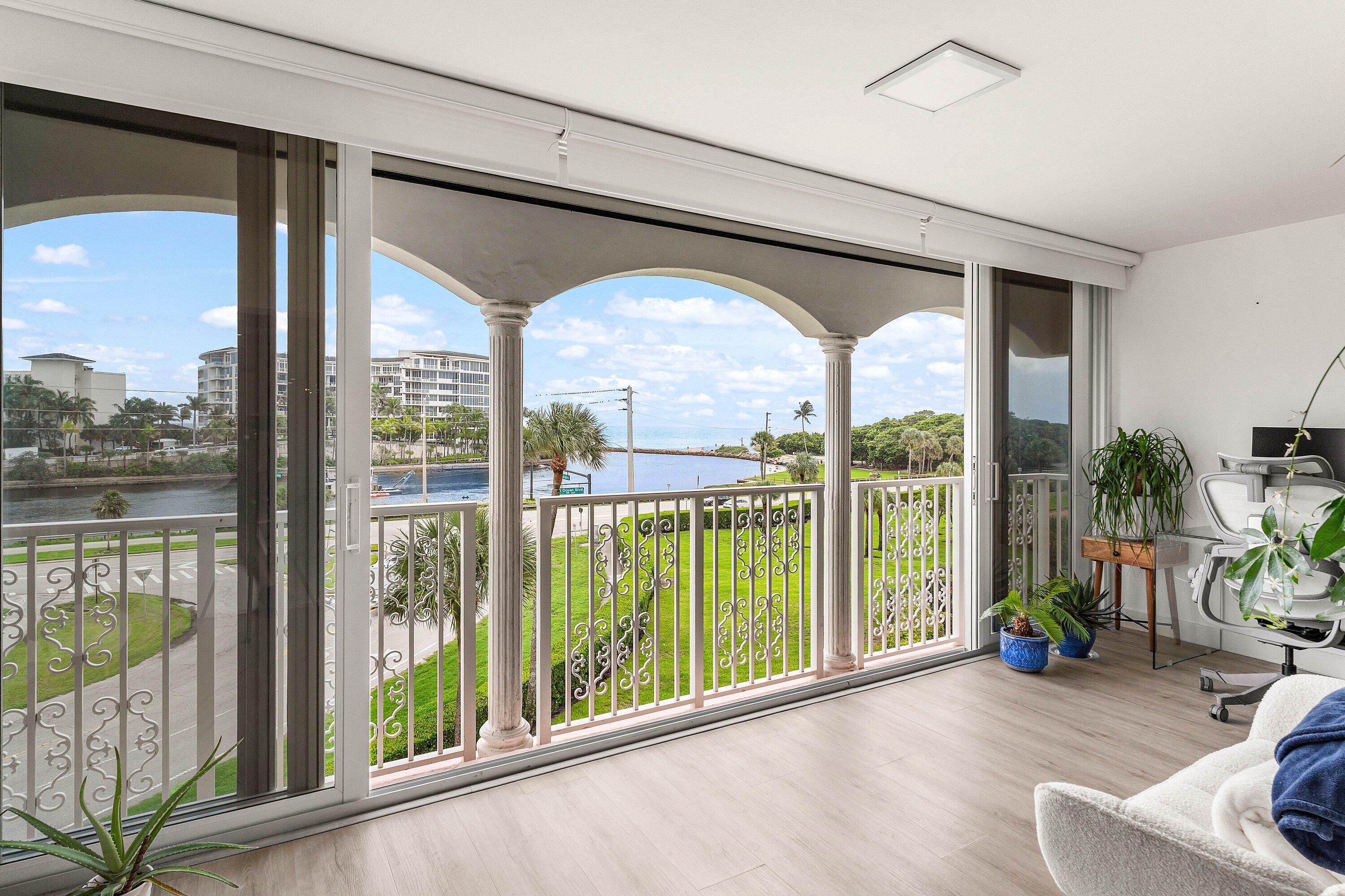 1001 East Camino Real, Unit 4040 Boca Raton, FL 33432 - Photo 31 of 44 a view of a house with a porch