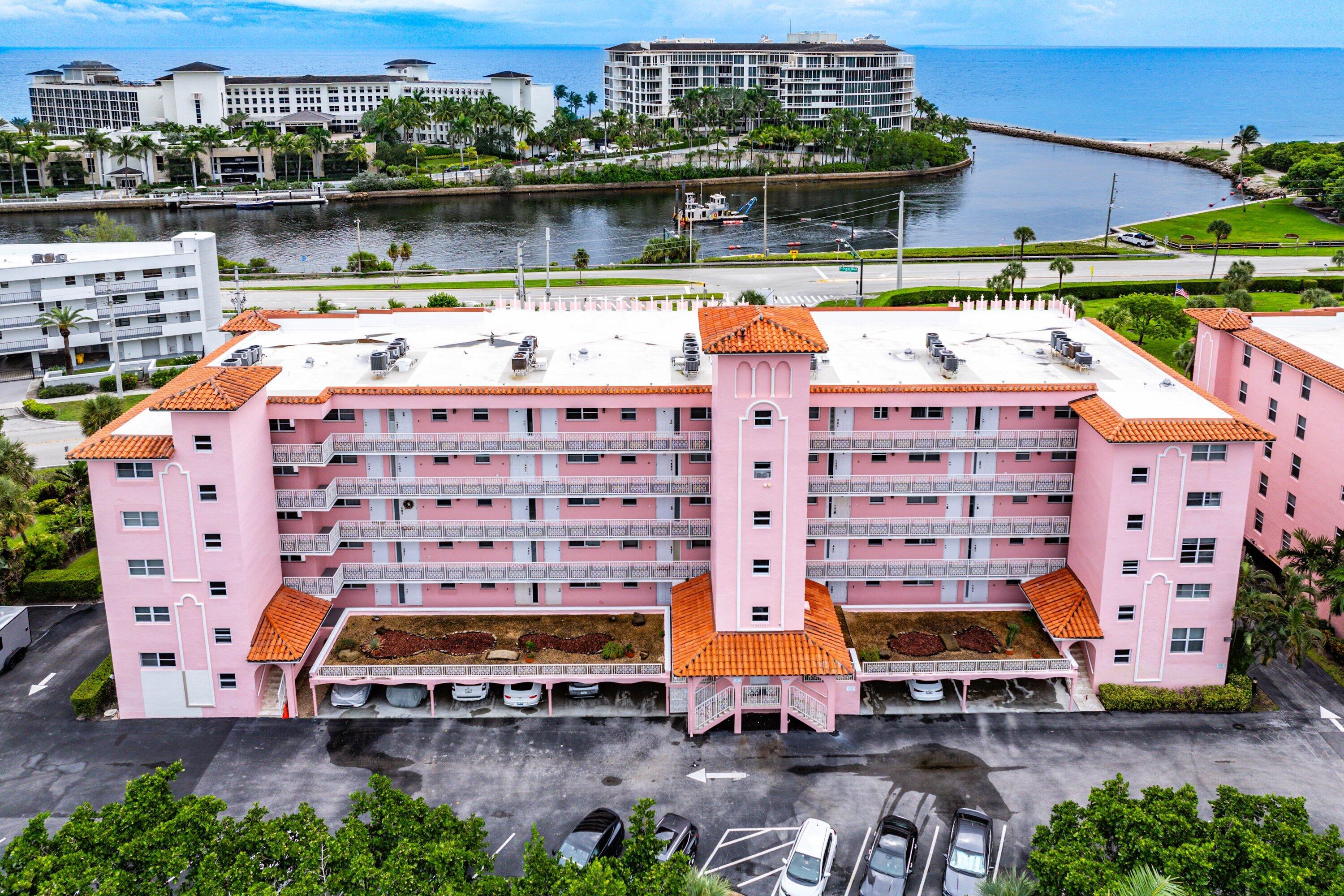 1001 East Camino Real, Unit 4040 Boca Raton, FL 33432 - Photo 36 of 44 an aerial view of a building with lake view