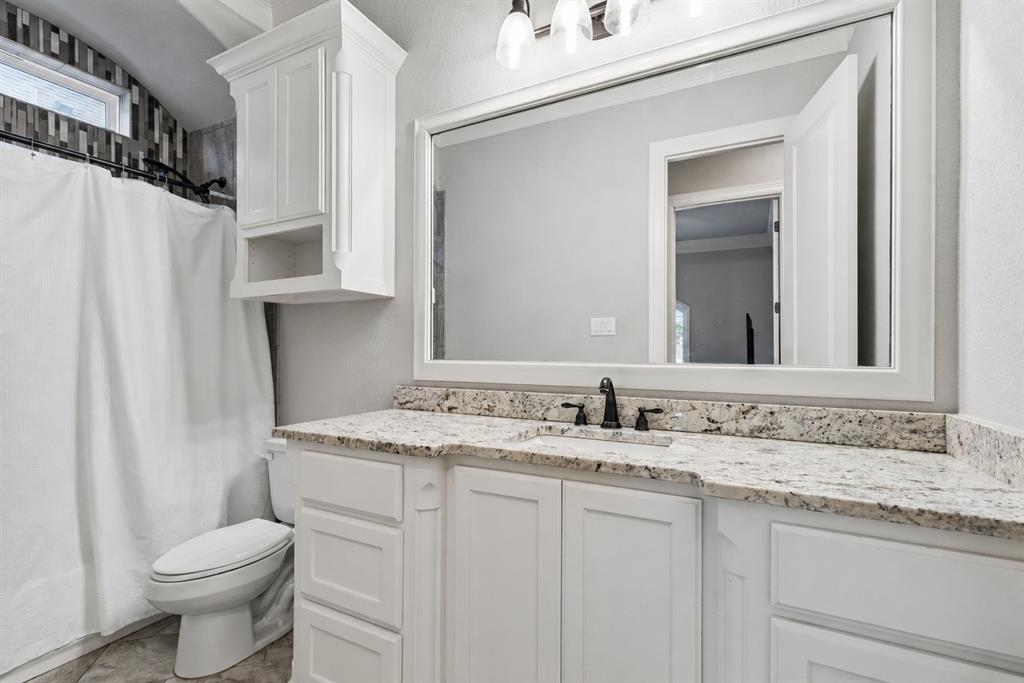 104 Ryder Court Hurst, TX 76053 - Photo 26 of 35 Stylish Full Bath With Designer Tile Shower