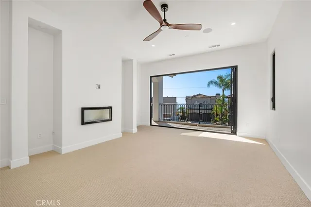 a view of a room with a large window