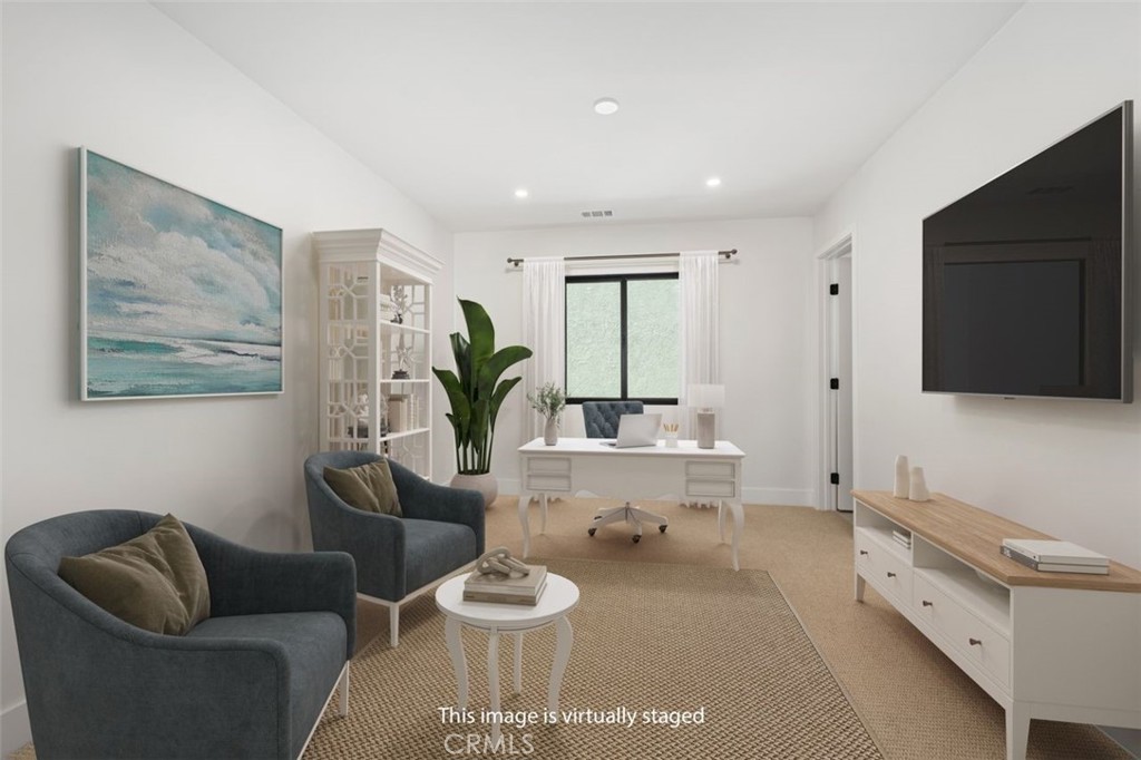 34882 Doheny Place Dana Point, CA 92624 - Photo 20 of 42 a living room with furniture and a flat screen tv