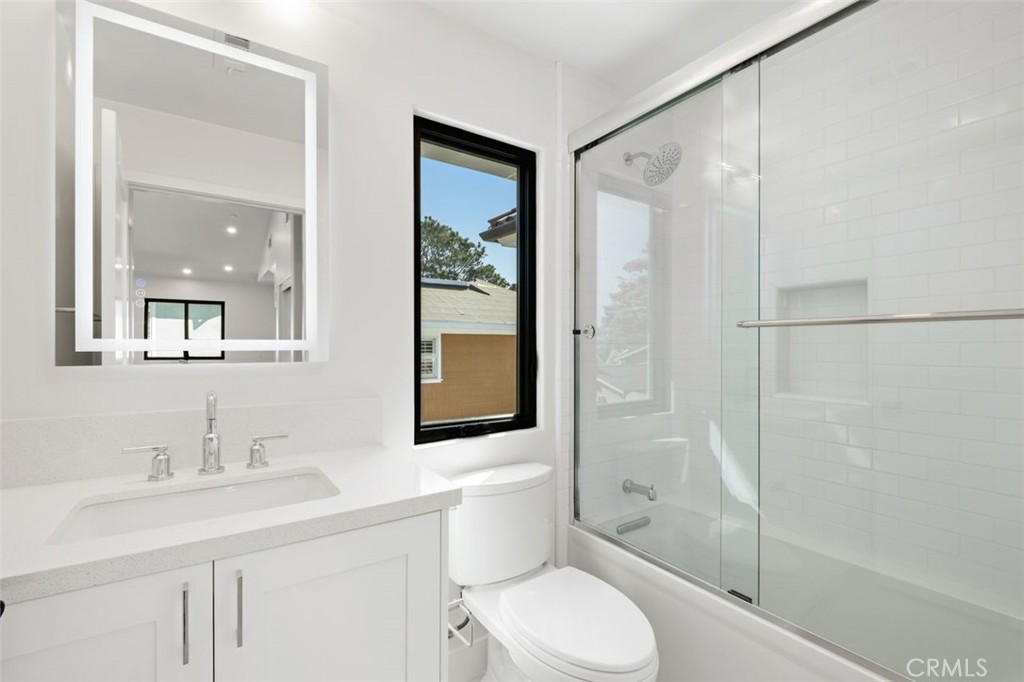 34882 Doheny Place Dana Point, CA 92624 - Photo 30 of 42 a bathroom with a sink toilet and shower