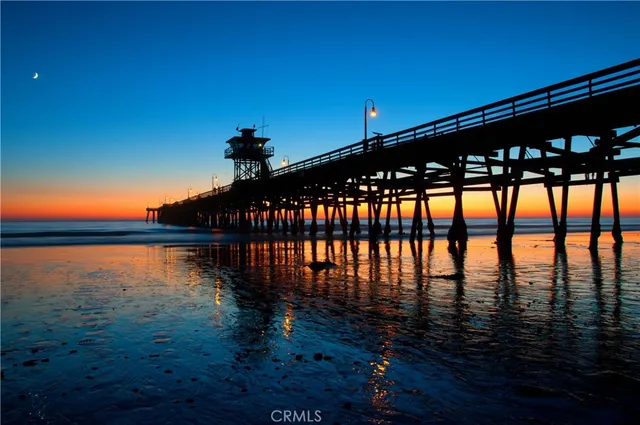 a view of swimming pool with outdoor seating