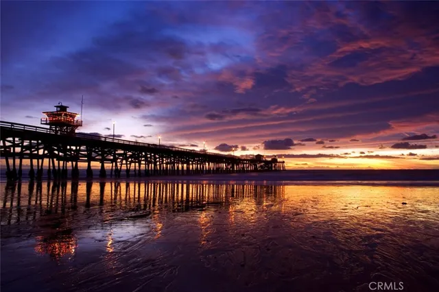 a view of swimming pool with outdoor seating