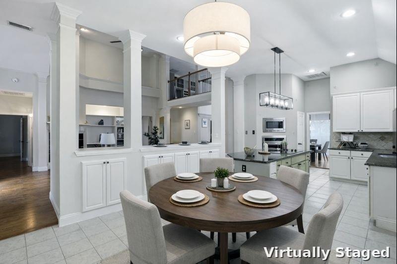 913 Cross Plains Drive Allen, TX 75013 - Photo 14 of 40 a view of a dining room and livingroom