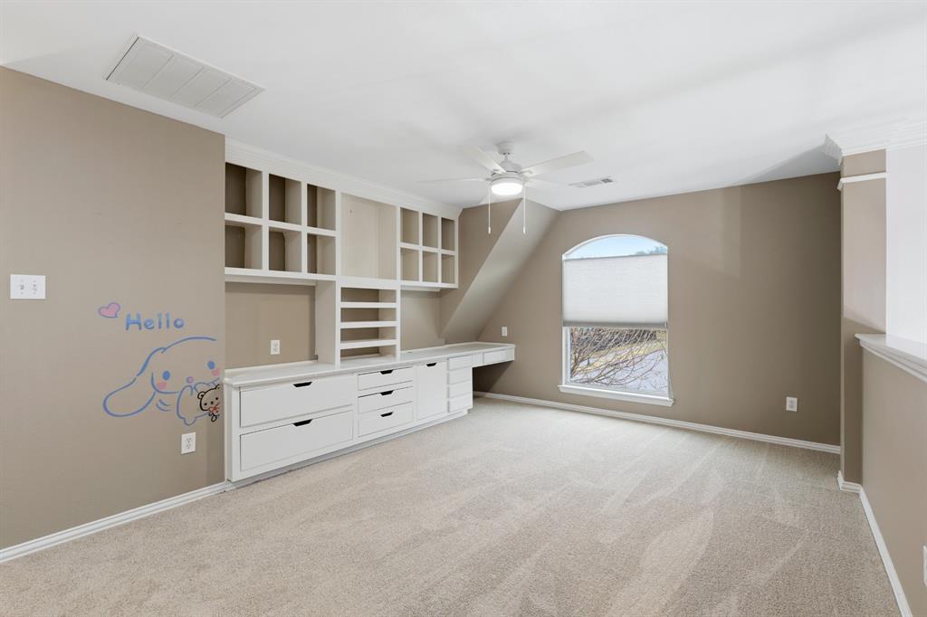 913 Cross Plains Drive Allen, TX 75013 - Photo 24 of 40 an empty room with windows and cabinet