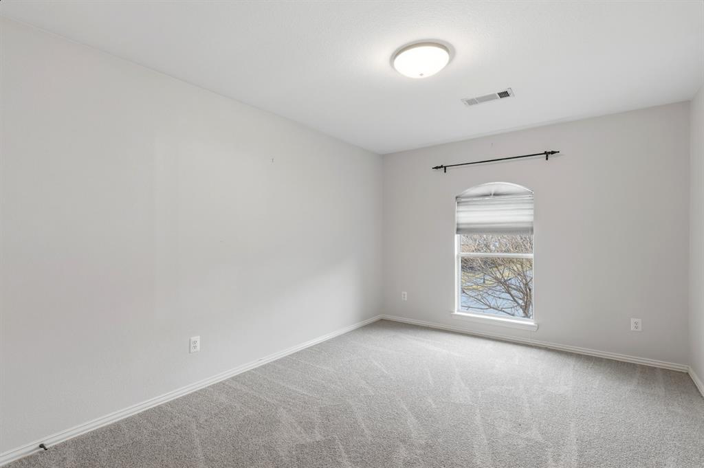913 Cross Plains Drive Allen, TX 75013 - Photo 27 of 40 an empty room with windows