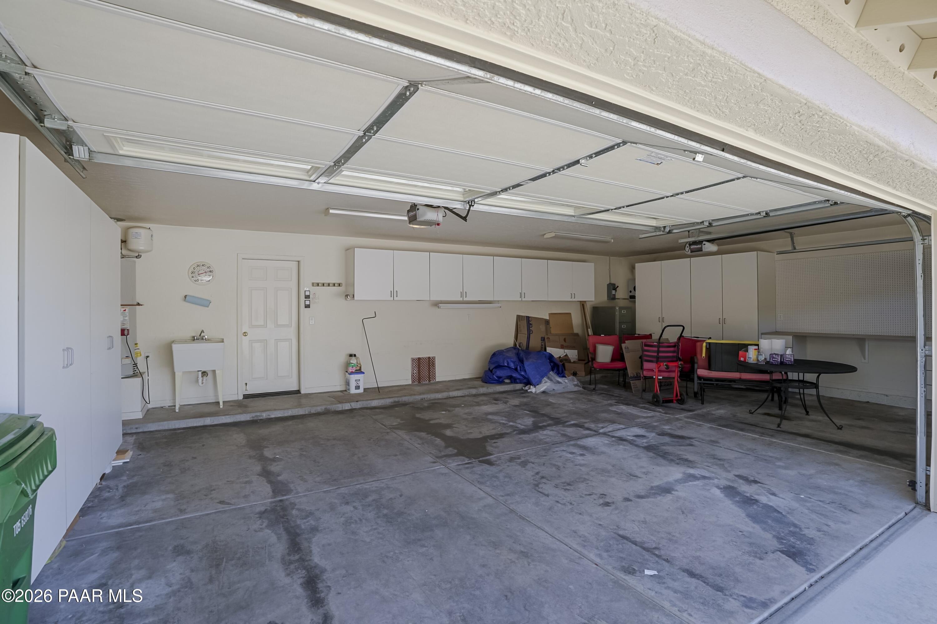 831 Peppermint Way Prescott, AZ 86305 - Photo 39 of 41 Spacious Garage w Cabinets