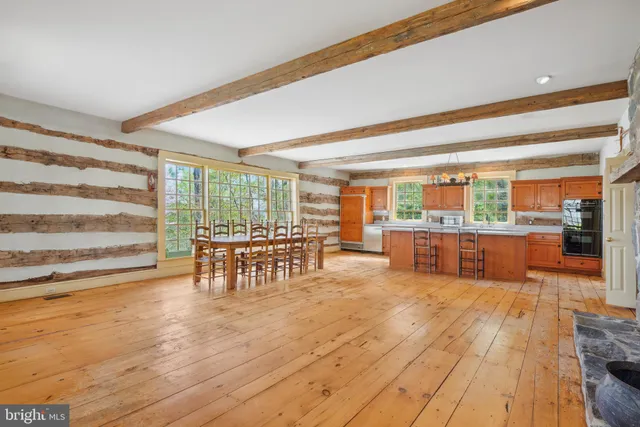 a bathroom with a sink mirror vanity and toilet