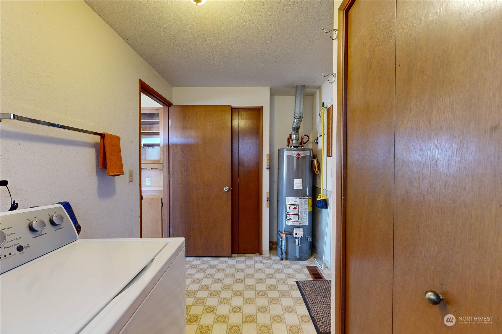 446 North 3rd Street Athena, OR 97813 - Photo 15 of 22 a bedroom with a bed and a chandelier