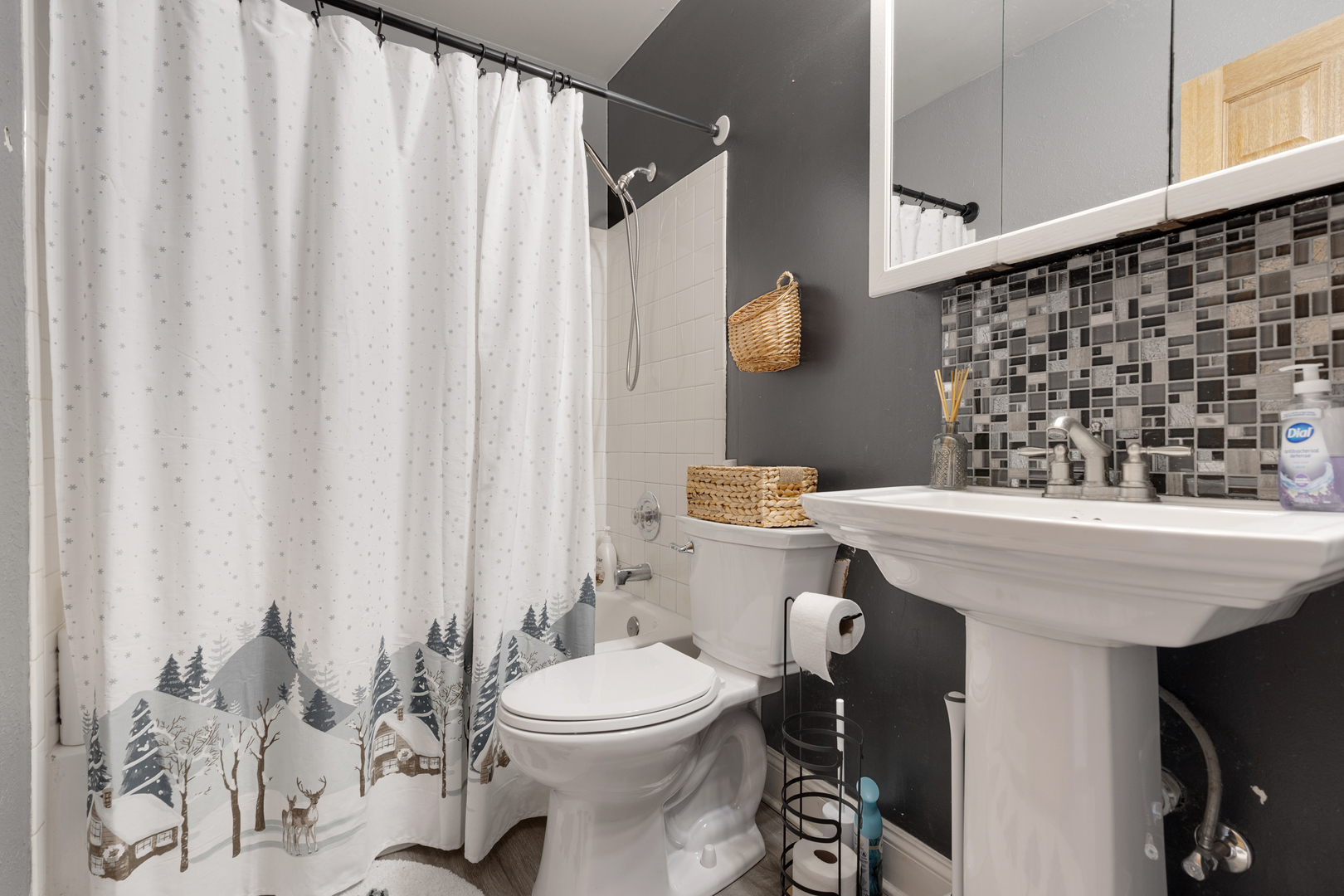 2615 Prairieview Lane Aurora, IL 60502 - Photo 16 of 24 a bathroom with a sink a toilet and shower curtain