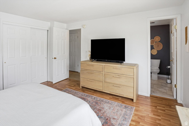 5108 South 2000th Street West Roy, UT 84067 - Photo 25 of 61 Bedroom featuring light wood finished floors and a closet