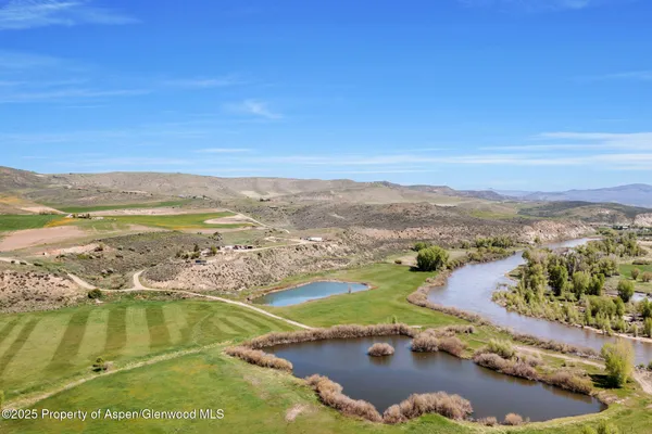 a view of a city with an ocean beach