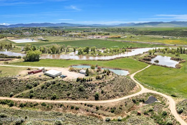 a kitchen with sink stove and cabinets