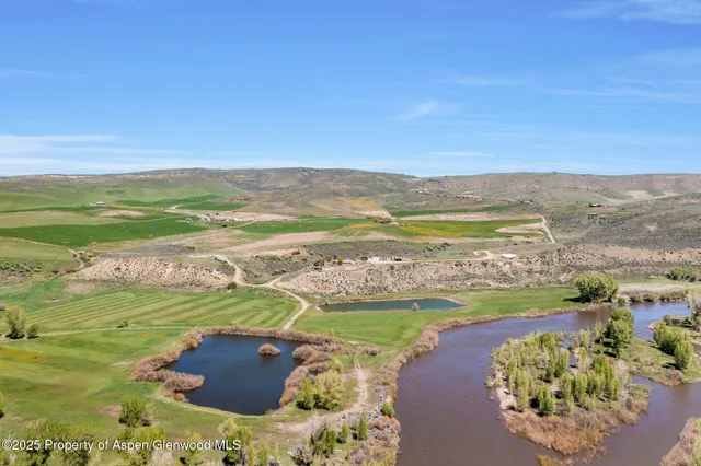 a view of a city with an ocean