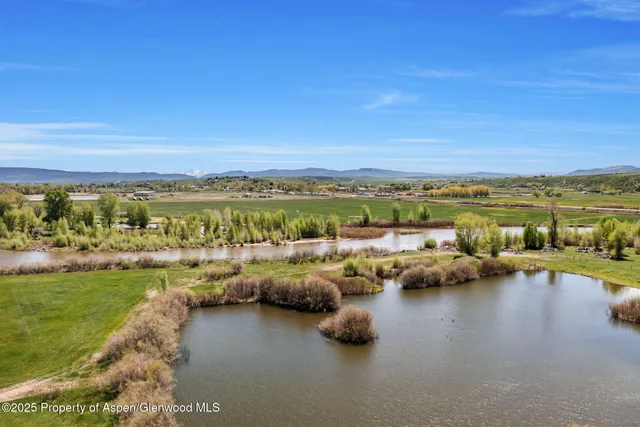 a view of a ocean with a mountain