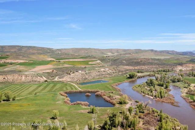 a view of an ocean and a mountain