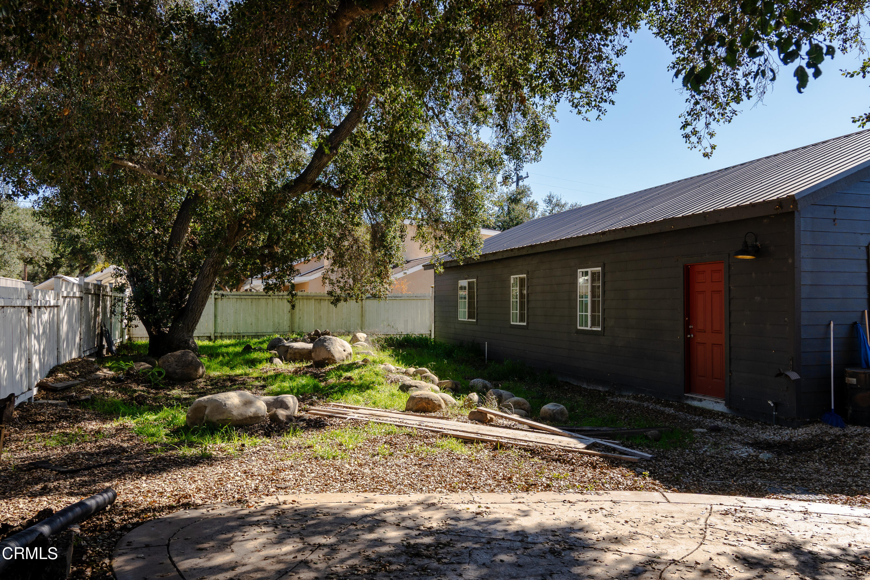70 Rockaway Road Oak View, CA 93022 - Photo 15 of 20 a backyard of a house with barbeque oven and outdoor seating