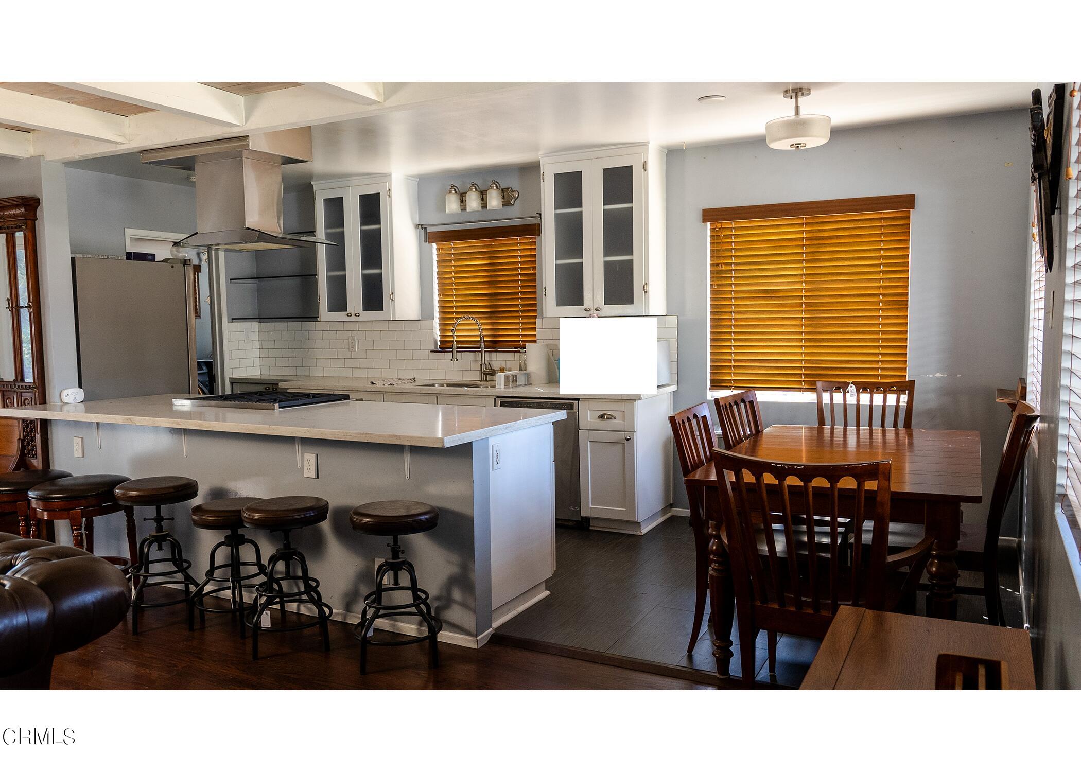 70 Rockaway Road Oak View, CA 93022 - Photo 3 of 20 a kitchen view of dining table chairs and window