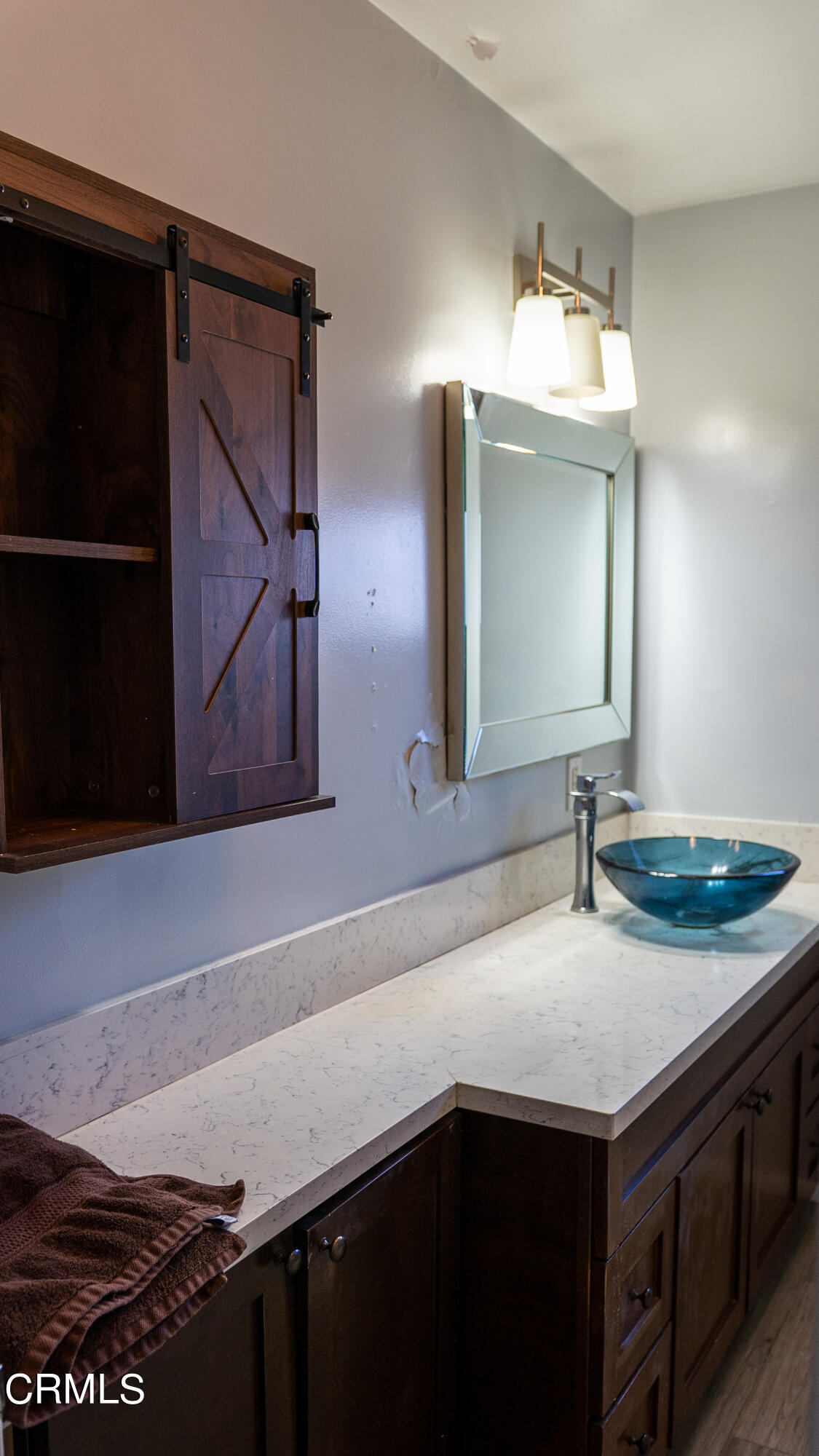 70 Rockaway Road Oak View, CA 93022 - Photo 6 of 20 a bathroom with a sink and a mirror