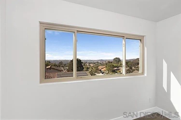 4334 Corral Canyon Road Bonita, CA 91902 - Photo 17 of 32 a view of an empty room and a window