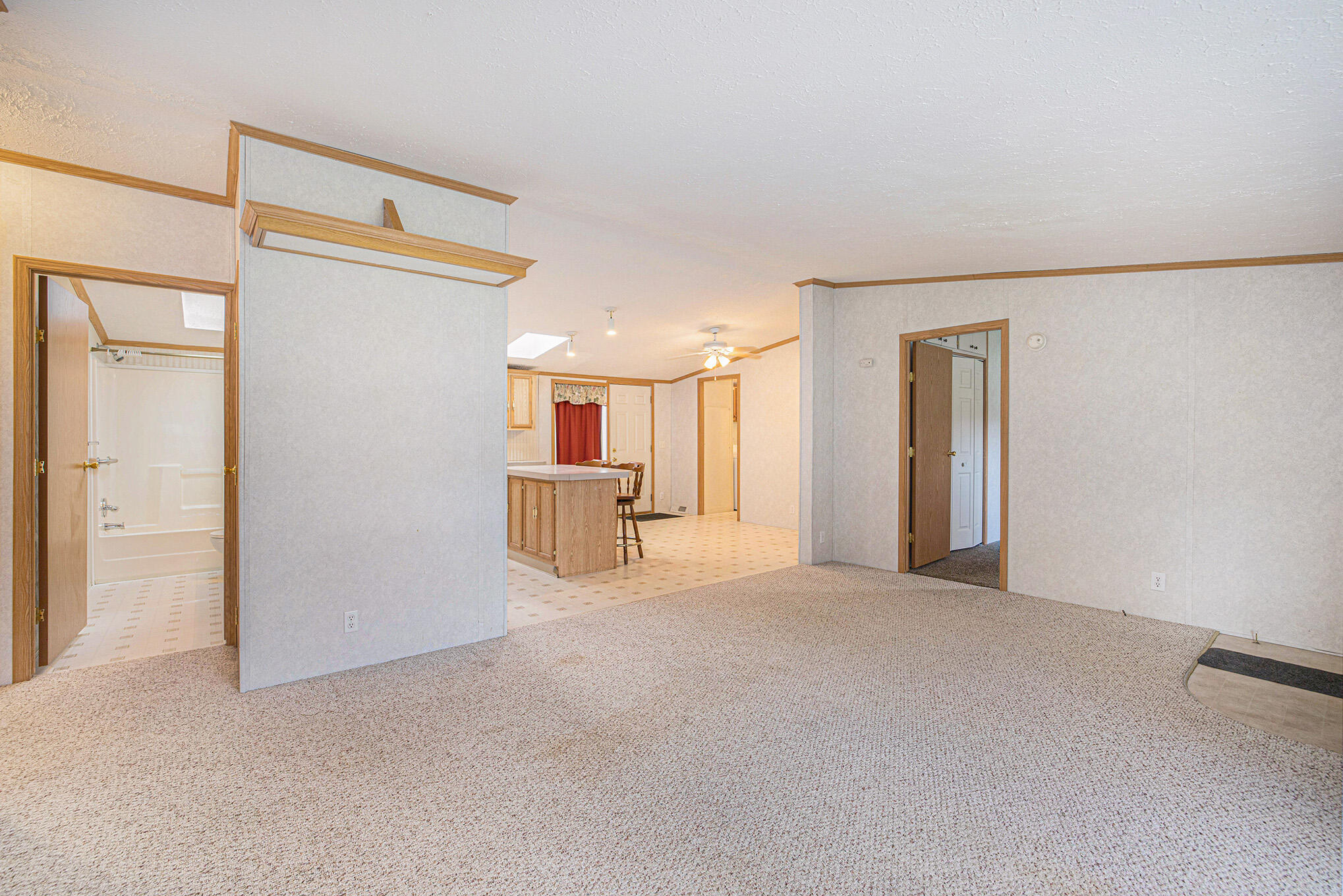 3349 Robinson Road Jackson, MI 49203 - Photo 6 of 22 6. Living Room with open view the the ki