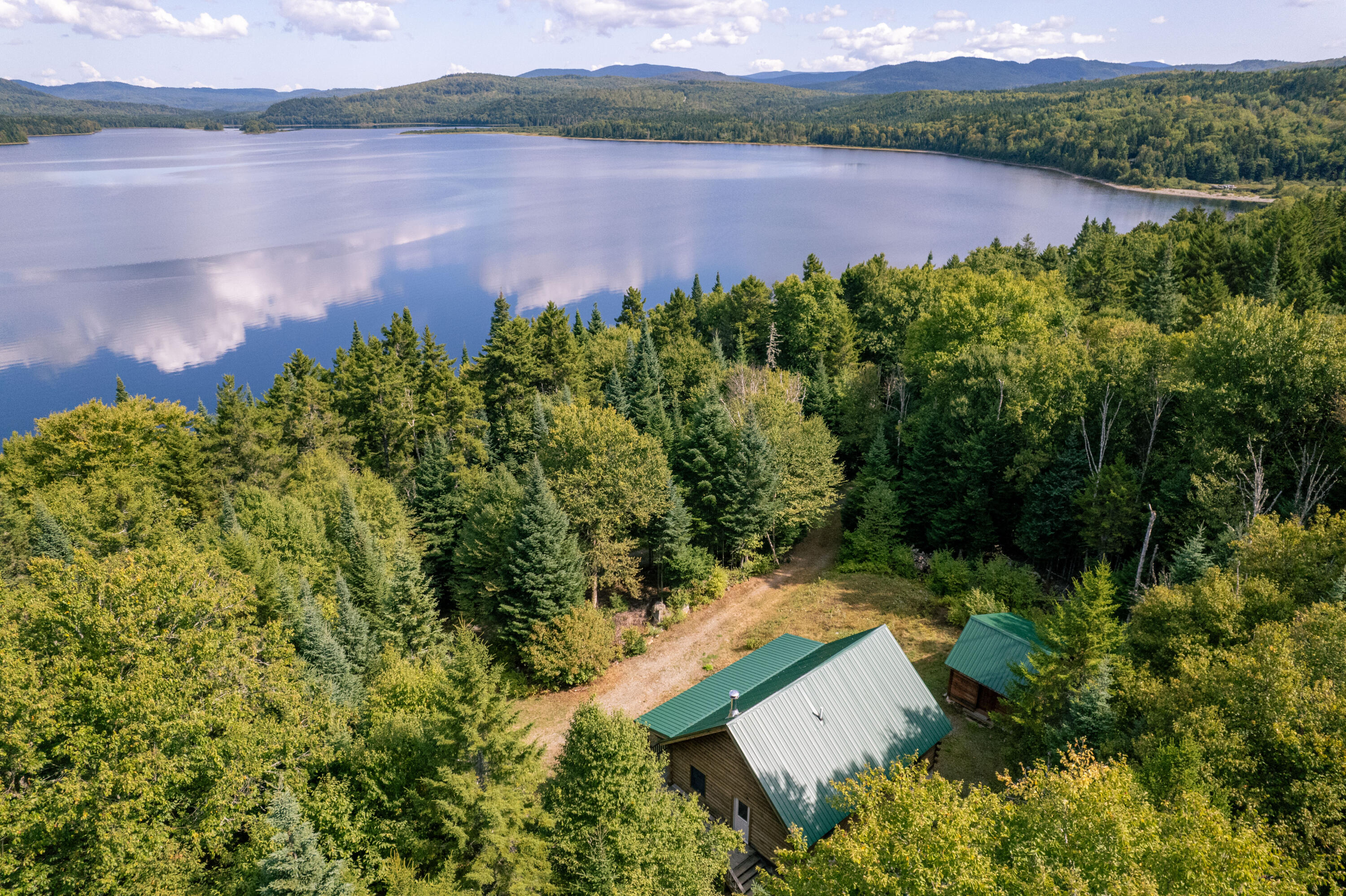 M2-l6 Dam Road Oquossoc, ME 04964 - Photo 4 of 32 NK_ParmacheneePropertyDrone_09-01-2025-7
