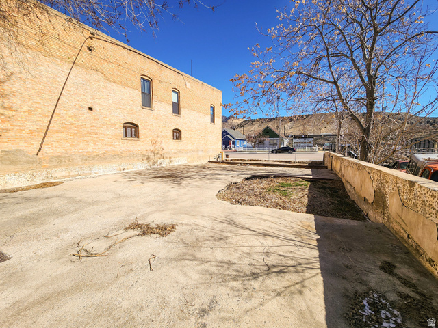 Undisclosed Address Helper, UT 84526 - Photo 4 of 6 Rear view of house featuring a patio