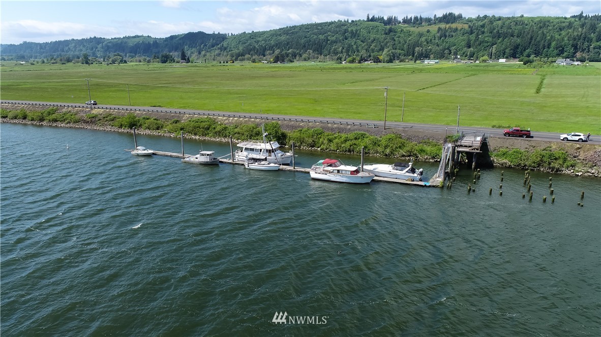 6400 B Willow Grove Road Longview, WA 98632 - Photo 6 of 26 a view of a lake with a mountain