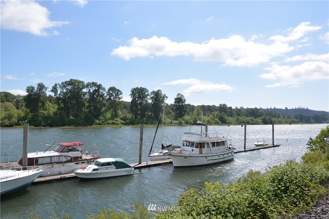 6400 B Willow Grove Road Longview, WA 98632 - Photo 9 of 26 a view of a lake with boats and trees