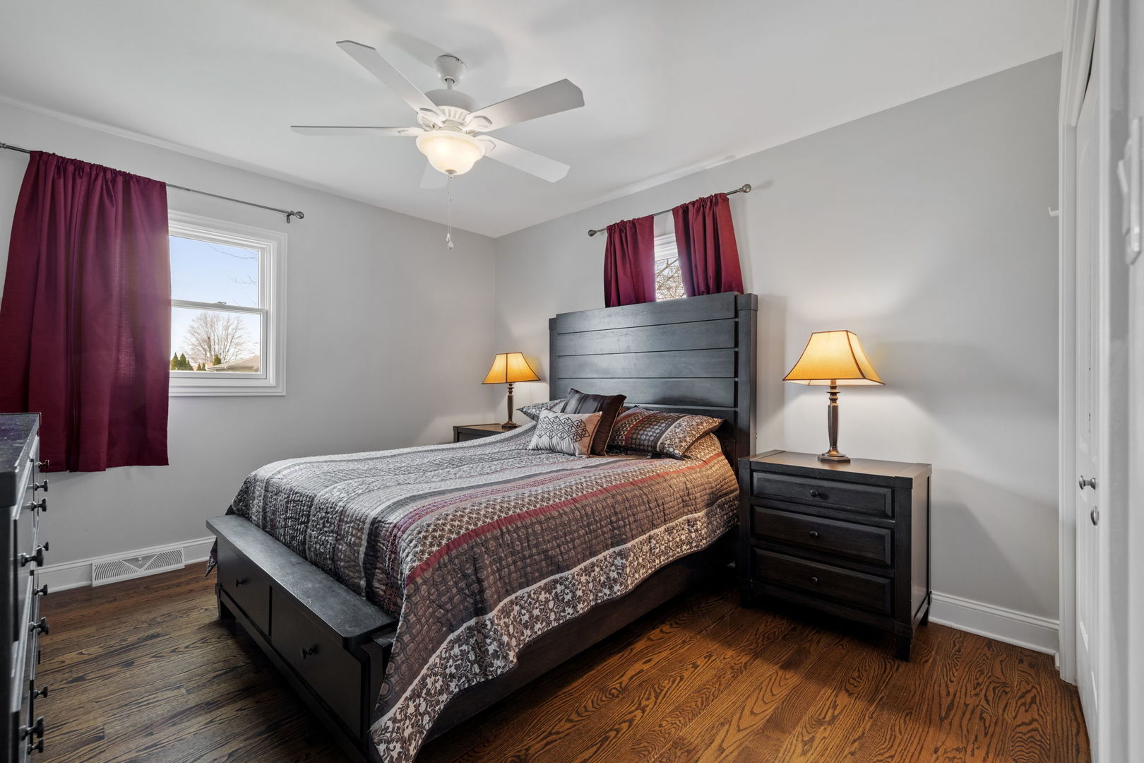 1024 South Cooper Road New Lenox, IL 60451 - Photo 10 of 22 a bedroom with a bed and wooden floor